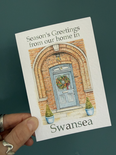 Season's greetings from our home in... (Festive front door)