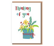 Thinking of you (yellow flowers in a tin)