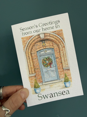Season's greetings from our home in... (Festive front door)
