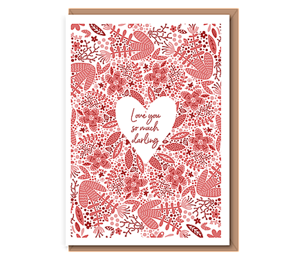Red foliage with “Love you so much darling” in cutout heart